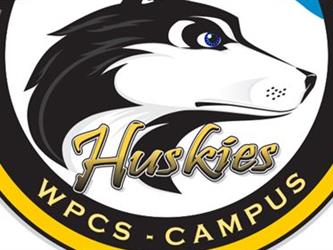 WPCS-Huskies Logo with a black and white dog.  