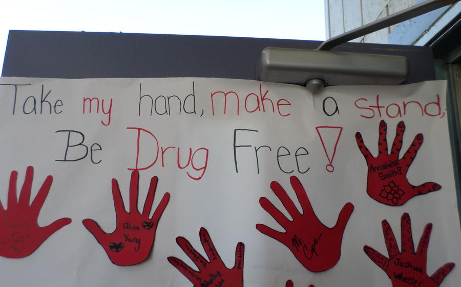Student artworks of hands. Text reads Take my hand make a stand be drug free